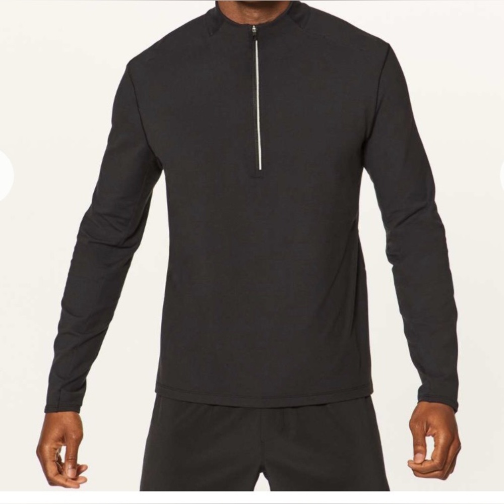 Lululemon Surge Warm 1/2
Zip
Black/SZ Small